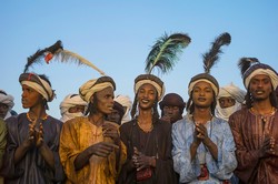 Fulani men during Guérewol, a festival, in Niger by Alfred Weidinger via Wikimedia.