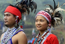 Garo couple in traditional attire by Vishma Thapa via Wikimedia.