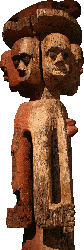 An Ijaw statue, the many faces of your enemies, by Quinn Dombrowski via Wikimedia.