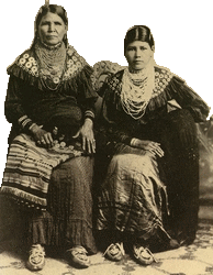 Two Delaware (Lenape) Nation citizens, Jennie Bobb and her daughter Nellie Longhat, in Oklahoma, in 1915.