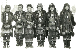 Group of Even (Lamut) women with national costumes from photoarchive REM via Wikimedia.
